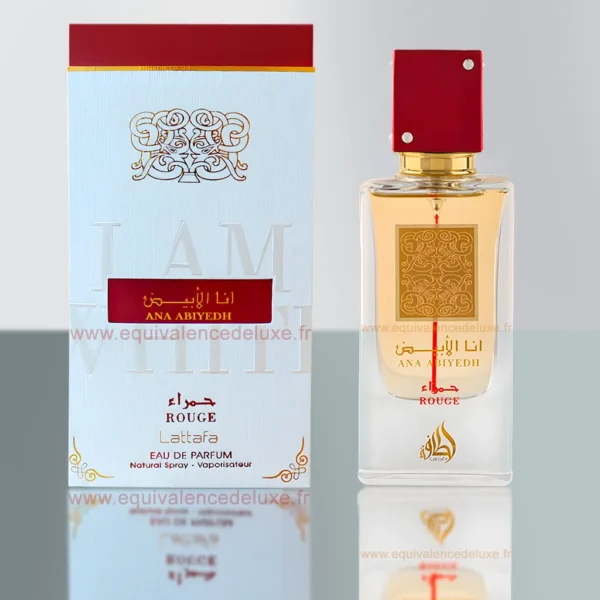 Flacon parfum Ana Abiyedh Rouge Lattafa 100 ml – bouteille transparente, capuchon rouge, décor arabesque doré, boîte blanche et rouge.